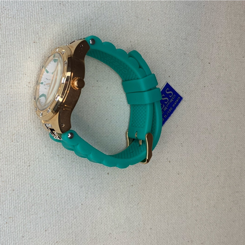 Guess Women’s Watch Teal and Gold Timepiece Green Band